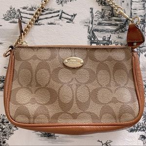 Coach signature monogram wristlet. Saddle and tan